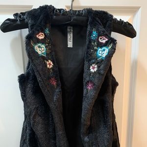 Black faux fur vest